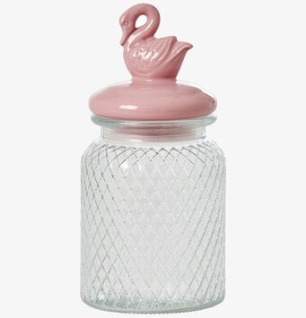 Bild av elegant glasburk med rosa lock och svandekor