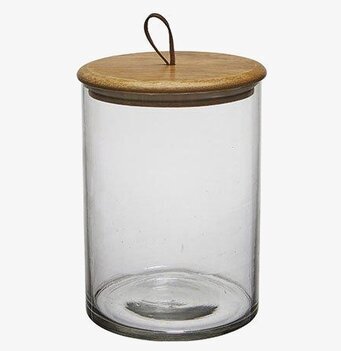 Bild av stilren glasburk med trälock och läderögla