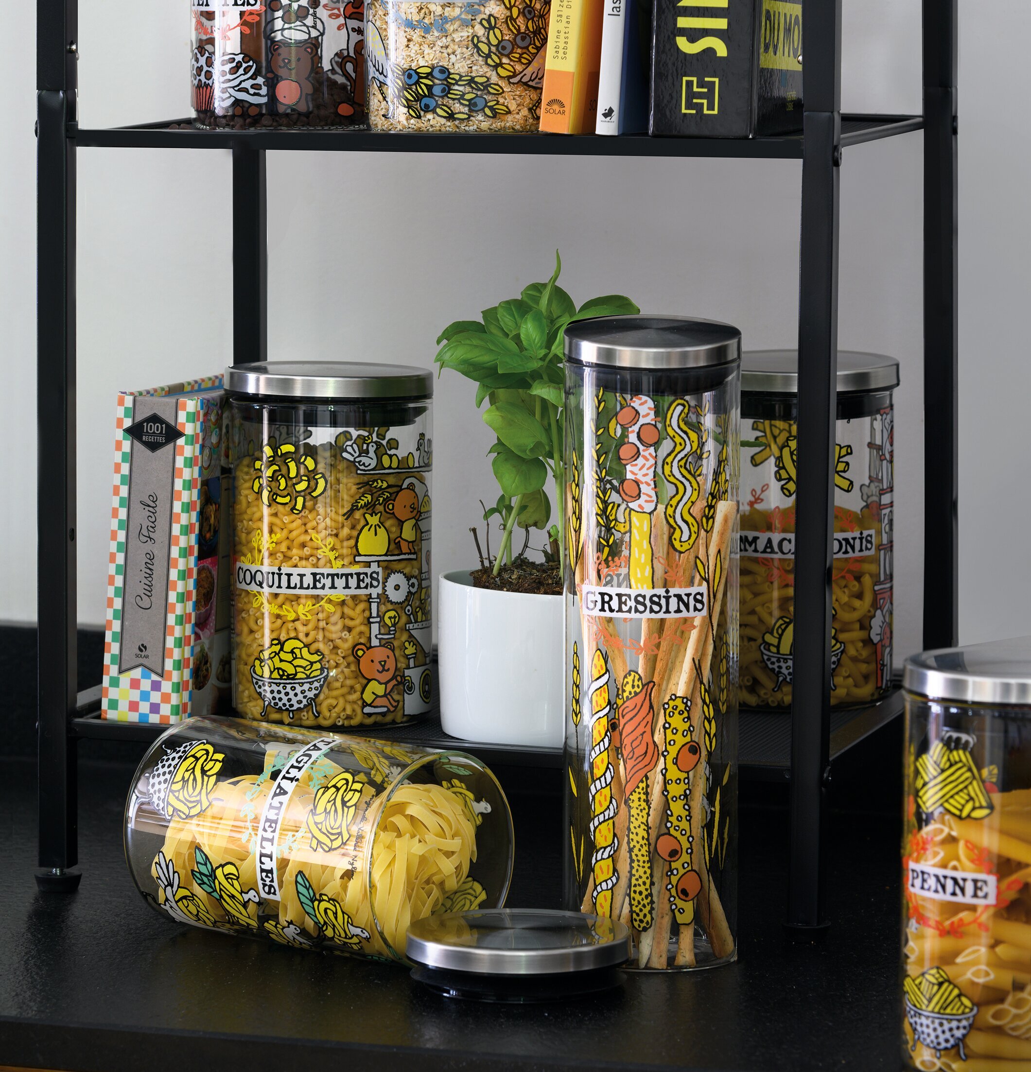 Glasburk Ris från Derriére la porte på en svart hylla