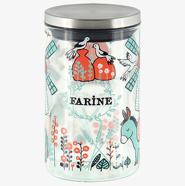 Bild av stilren glasburk med livfull och lantlig design