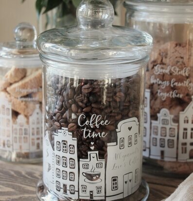 Foto av elegant glasburk för kaffebönor och livsmedel