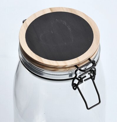 Bild av stilfull glasburk med trälock och svart klämma