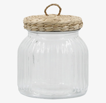 Bild av glasburk med flätat lock och räfflad textur
