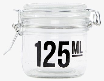 Bild av glasburk med elegant design och funktionalitet